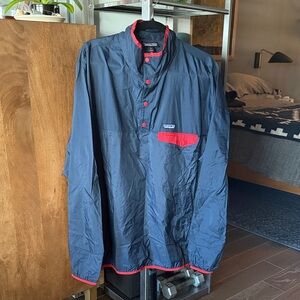 Patagonia Men's Dark Blue Windbreaker with Red Accents